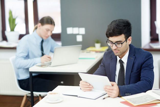 Certified translator reviewing legal documents at a desk