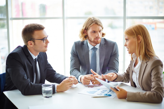 Expert translators marking a document for certified translation