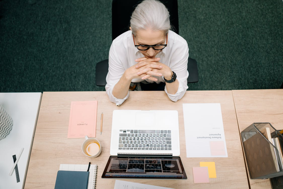 a woman using her computer.
